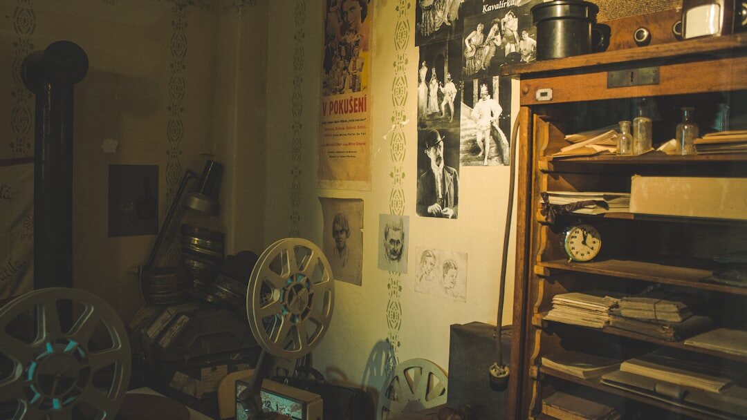 Archive room of an old advertising agency with film reels, storyboards and printed posters